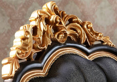 golden color wooden carving on sofa